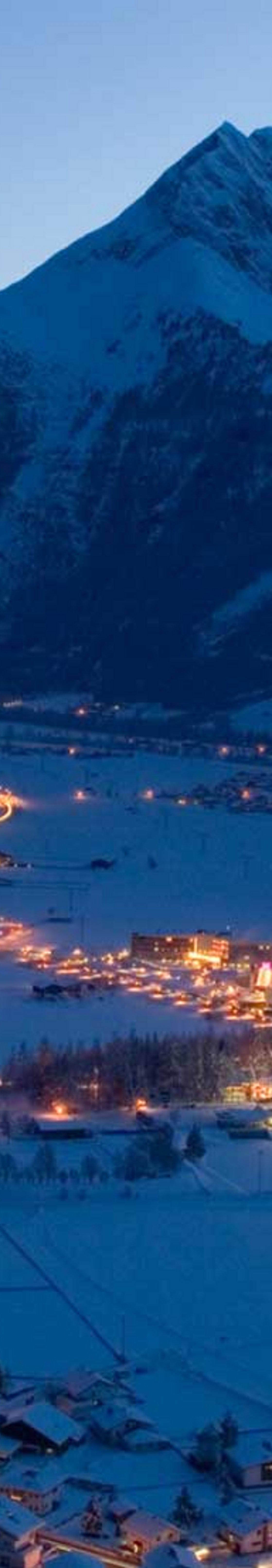 Blick auf Längenfeld im Winter